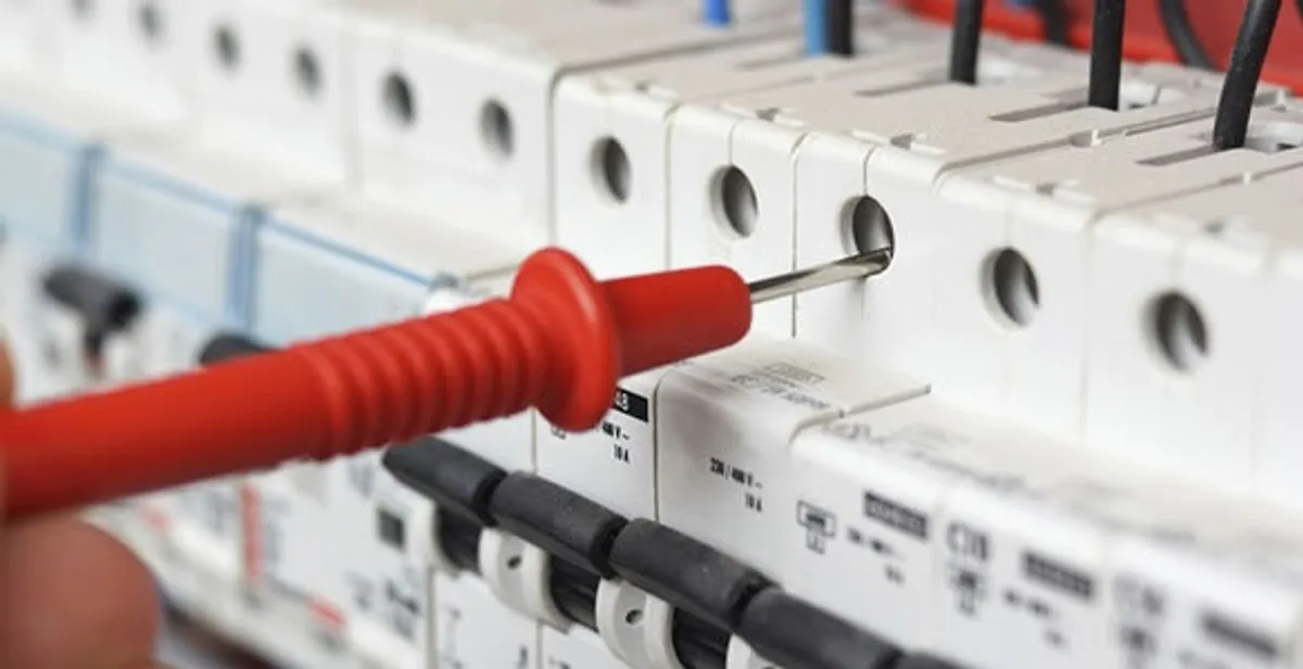 Electrical contractor testing circuit breakers during electrical repair in Berkeley, CA