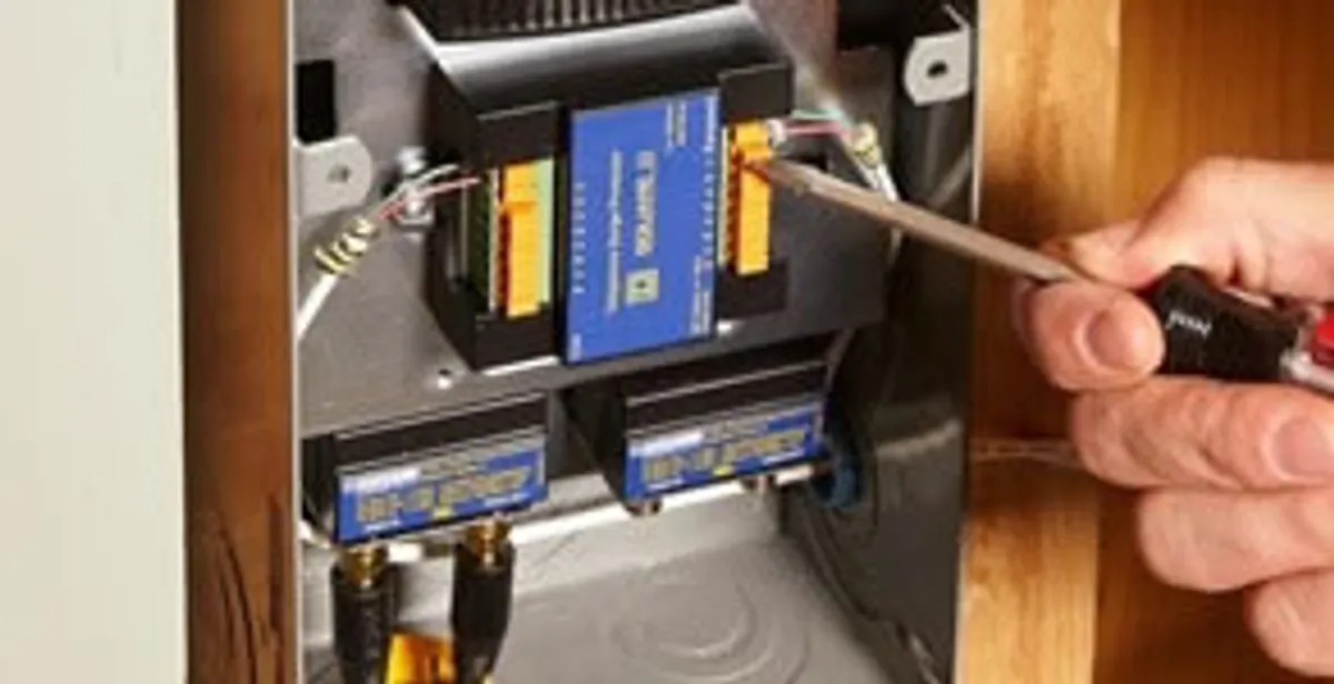 Whole home surge protection device being installed by a licensed electrician to protect electrical systems in San Francisco, CA